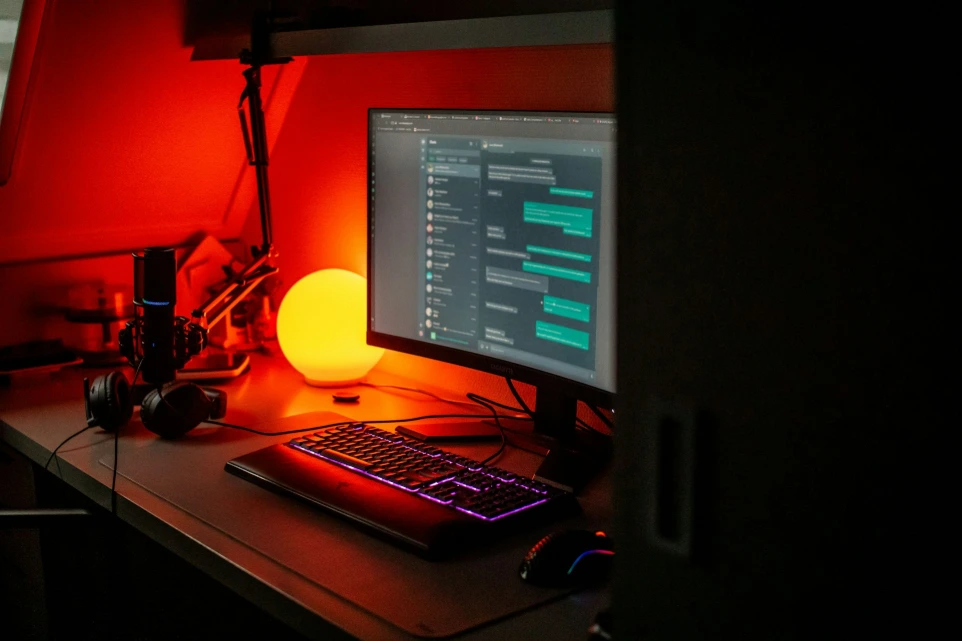 A desktop computer sitting on top of a wooden desk